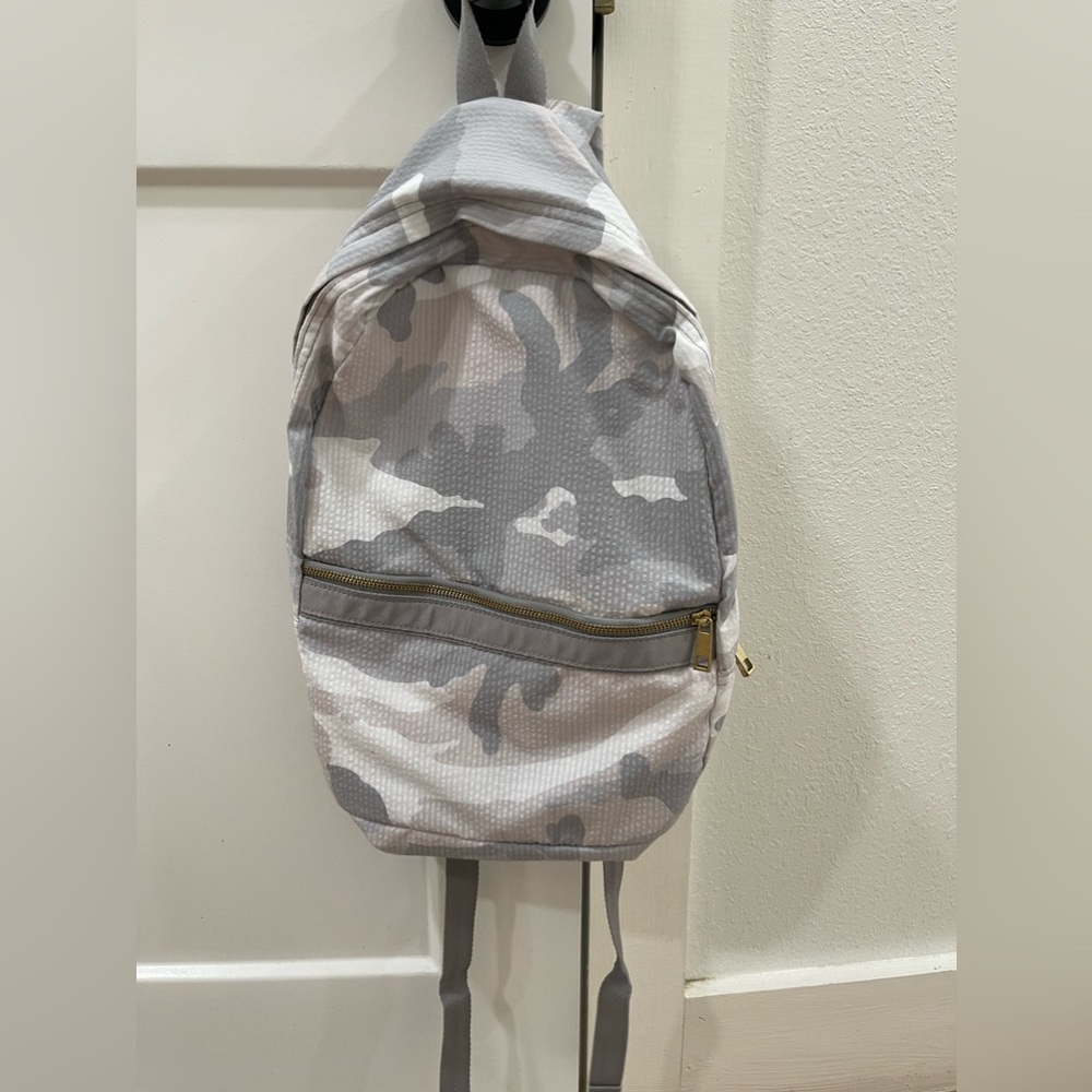 Mini gray camo backpack with gold zipper